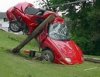 thRed car nose dive.jpg